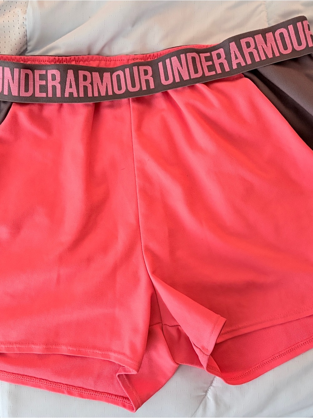 Under Armour Women’s Coral Pink Athletic Shorts